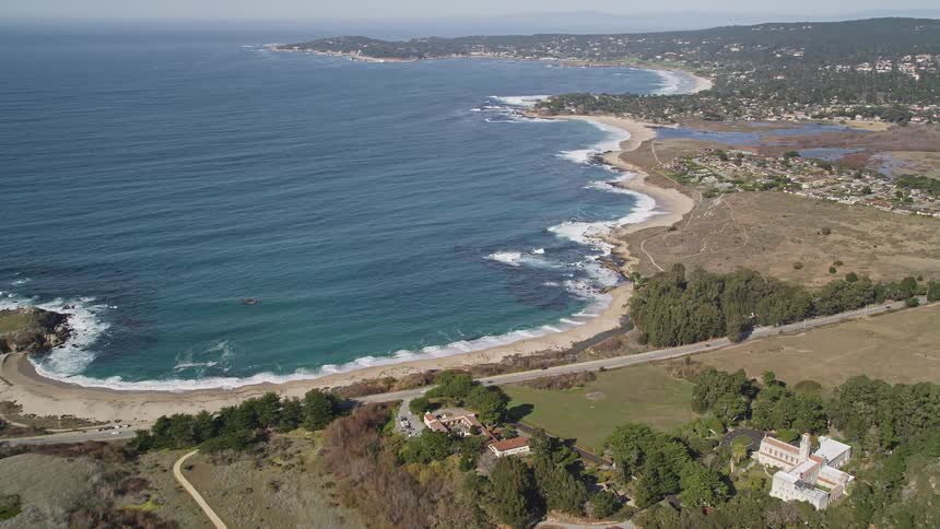 Landscape of a seaside peninsula with an extensive highway