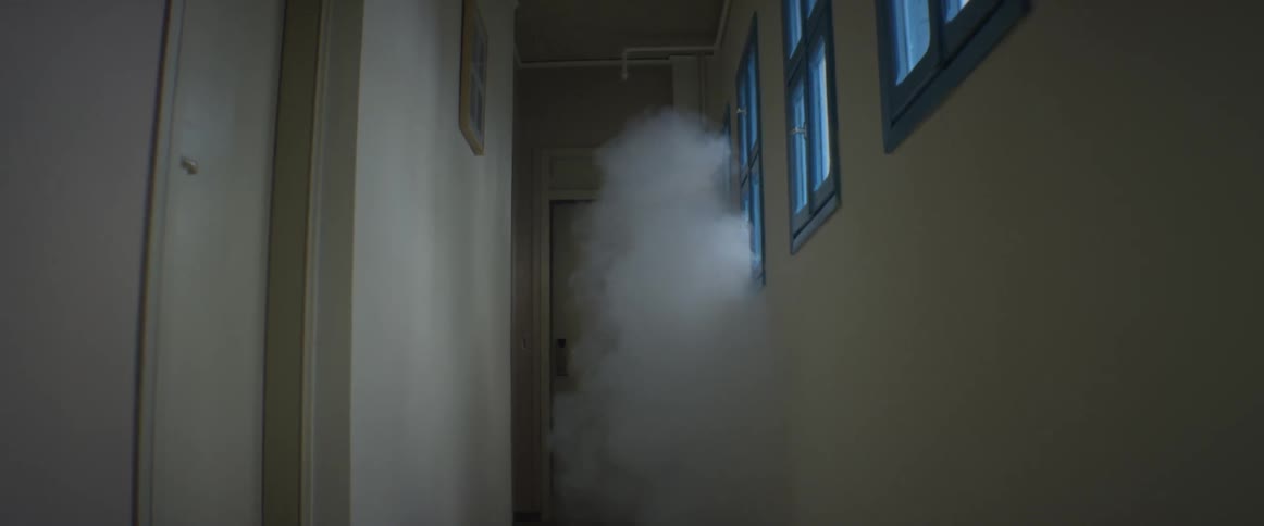 Smoke billowing in a hallway
