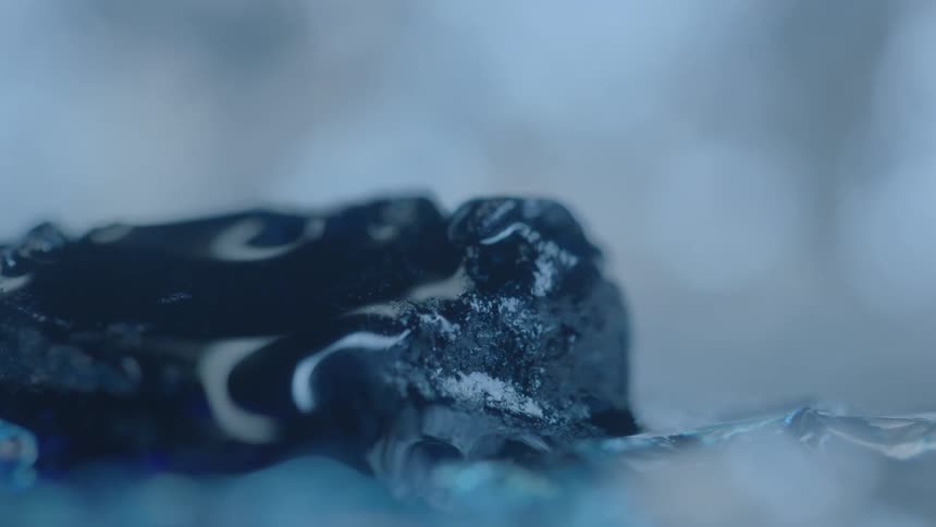 Water drops off the top of a rock