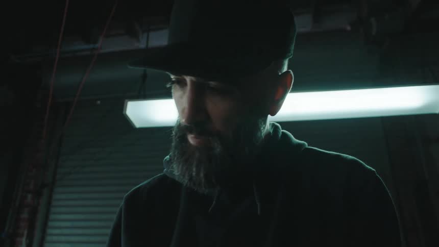 A close up clip of a man with a beard face
