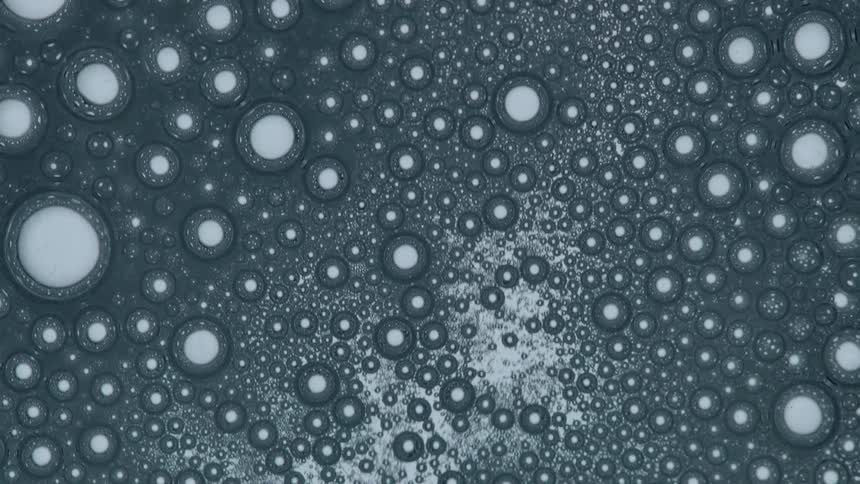 Many bubbles forming as water comes and goes
