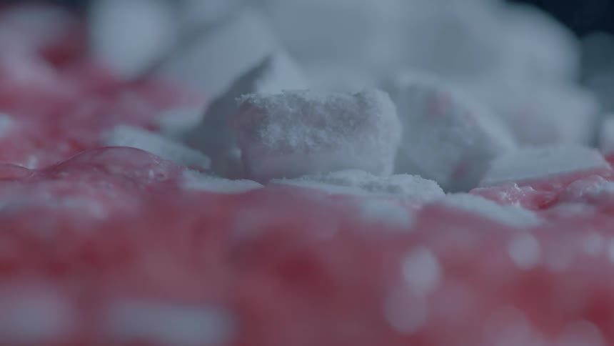 The white substance begins to boil red