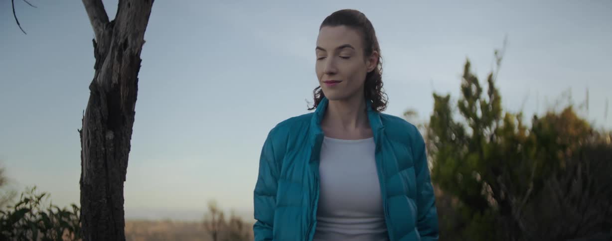 A woman is hiking in nature