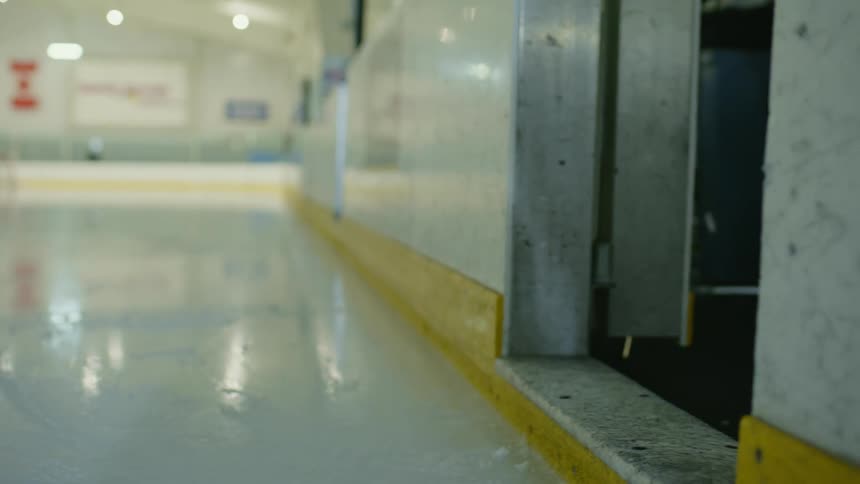 A clip of a player making an entrance into a hockey rink