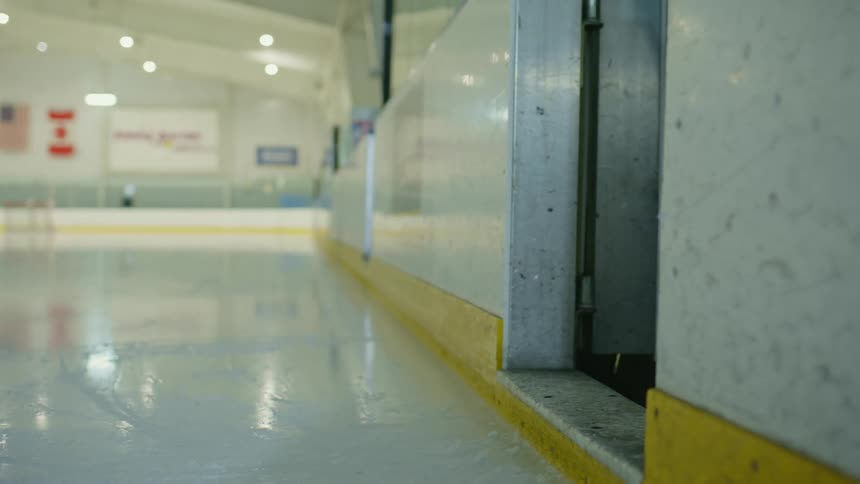 Hockey player exiting the rink
