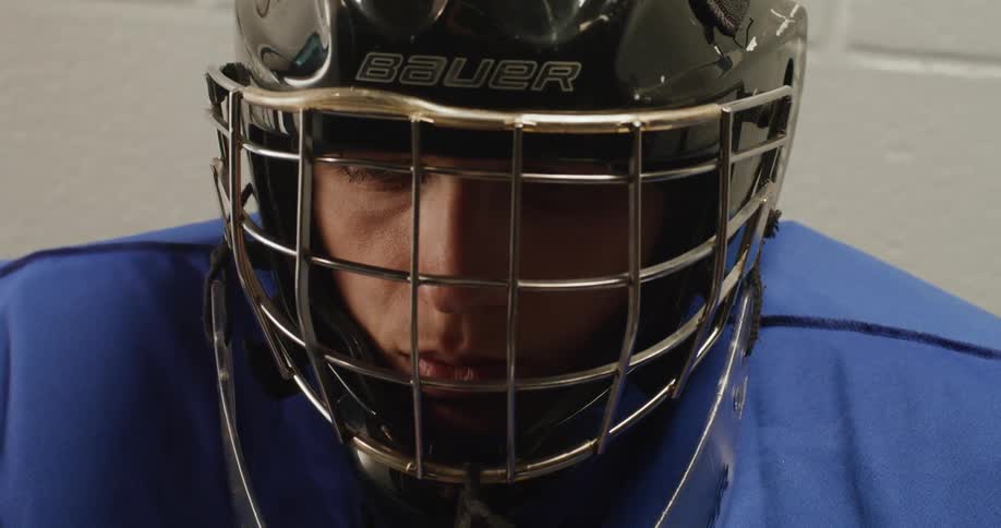 Portrait of a man in sports hockey helmet