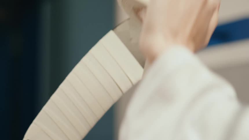 Tape being run through hockey equipment