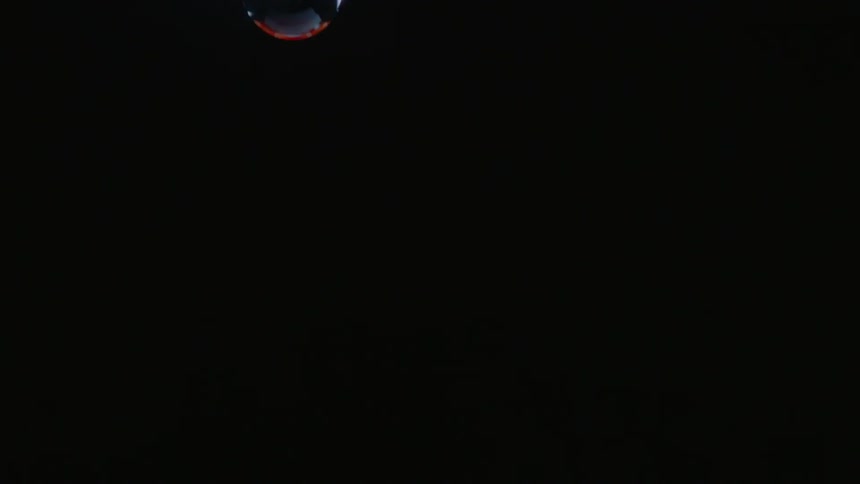 A thick liquid drips slowly