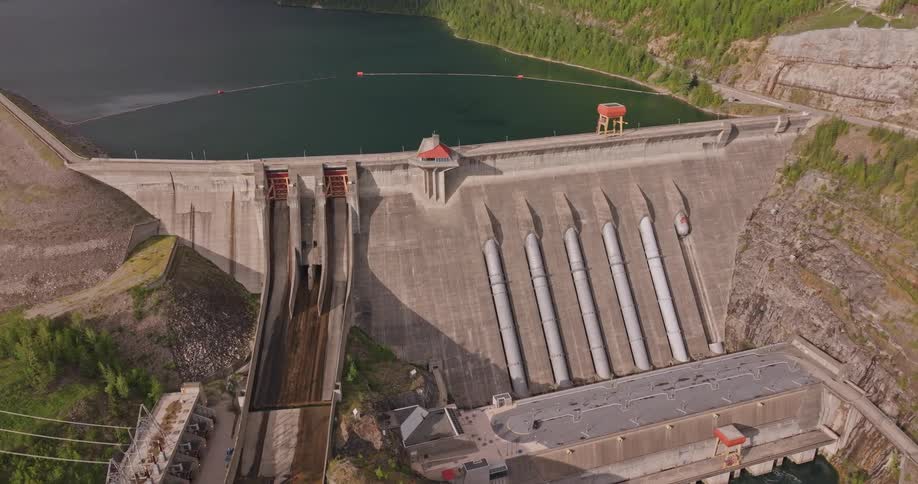 Power lines lead from hydroelectric dam