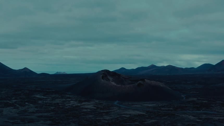 The landscape is overcast with clouds