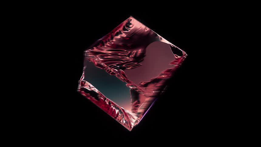 Abstract reddish ice cube rotating on a black background