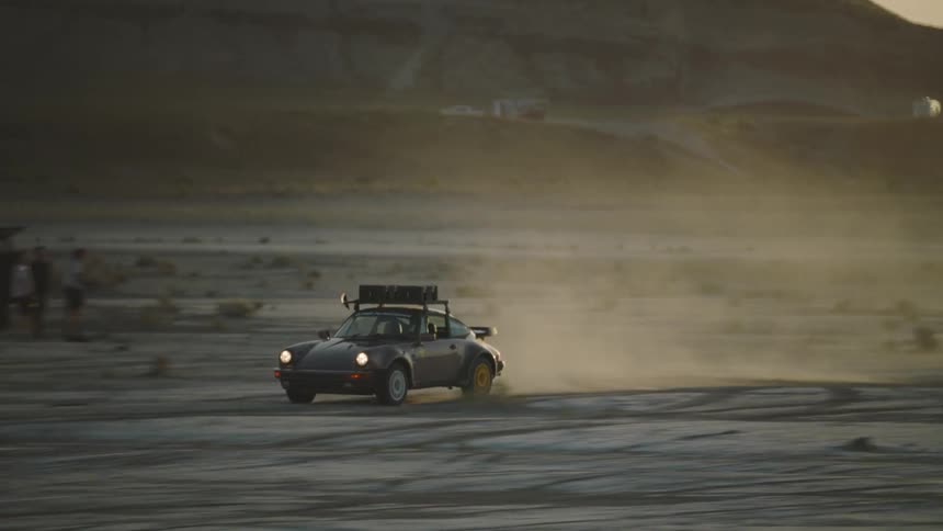 A car on a rally through the desert