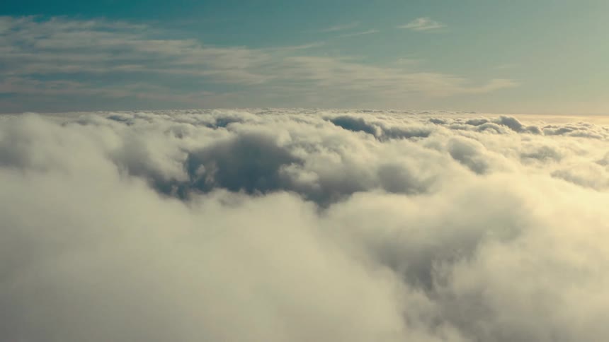 A dense layer of clouds floating in the sky