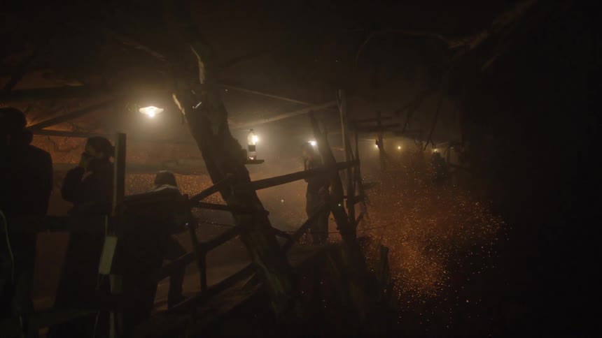 Dark area with fireworks being shot off into the air