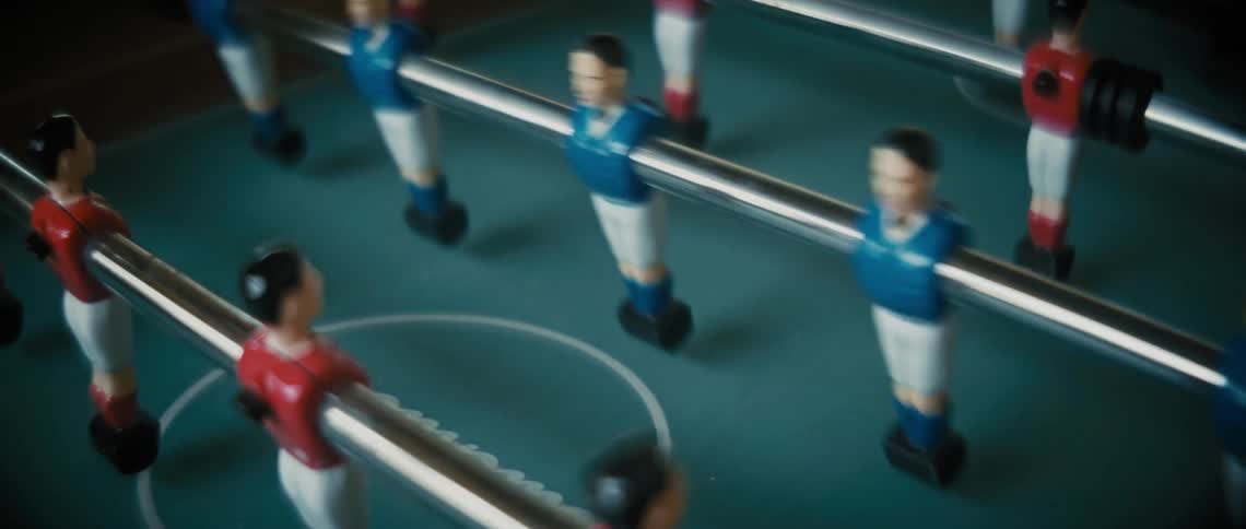 The figures on the foosball table spin