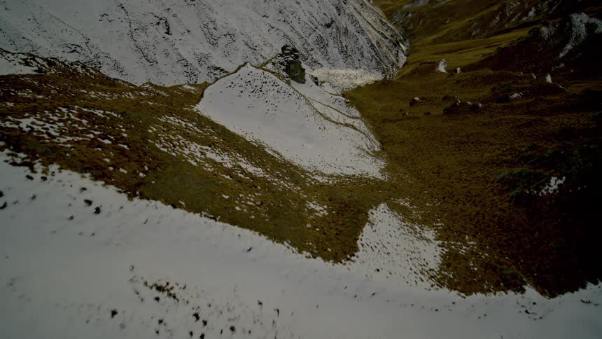 The snow on the mountain is melting