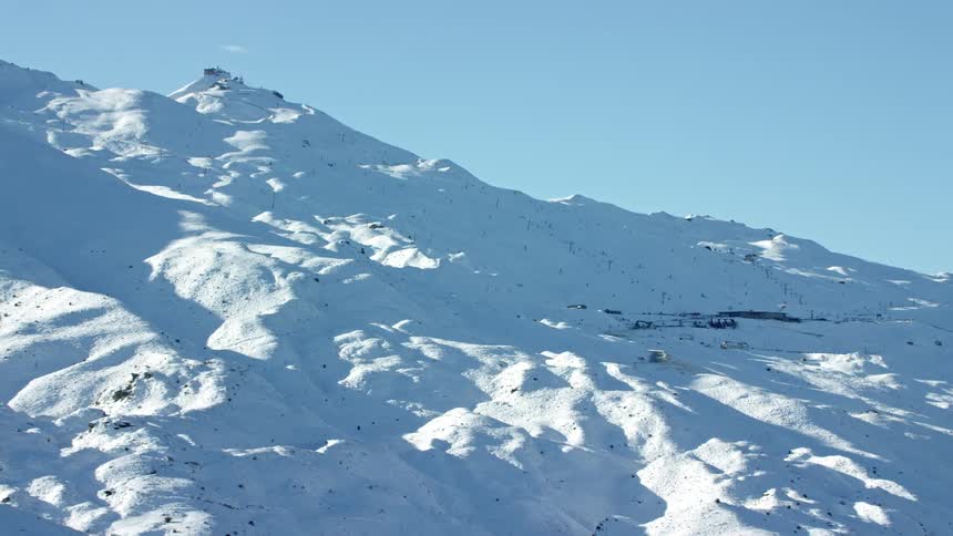 Coronet Peak ski field  mountains are covered with snow in Queenstown New Zealand