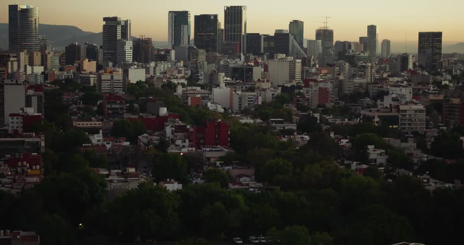 A city downtown area at sunset