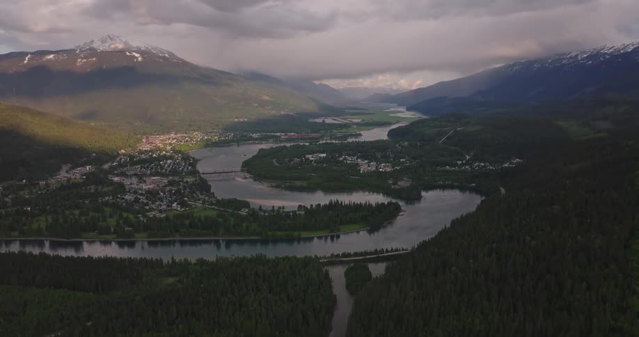 An aerial clip of a river in the woods