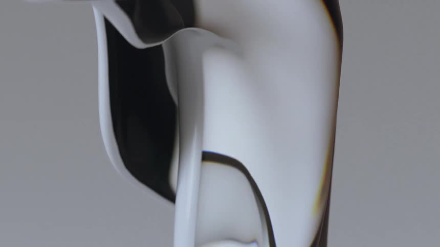 A fizzy abstract liquid flowing against a gray background