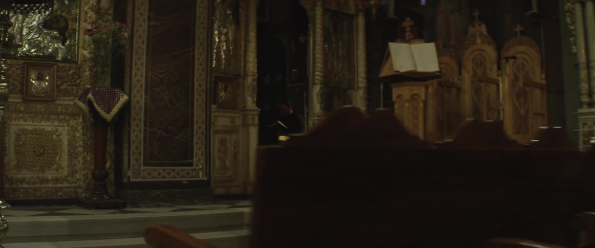 Man reads a bible in a church