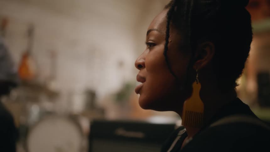 A clip of a female musician singing