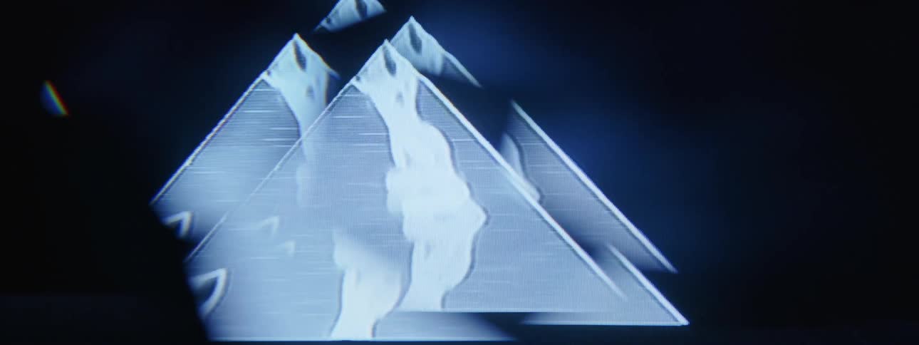 A graphic design moving across a television screen