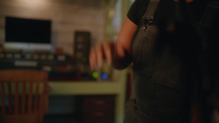 A clip of a female musician dancing