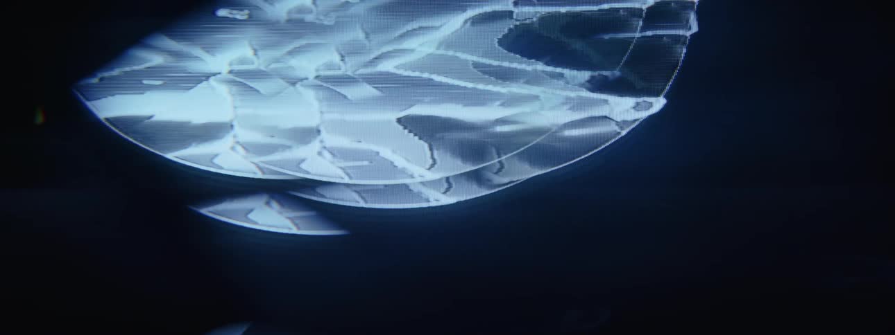 Abstract projection passing on a black background screen