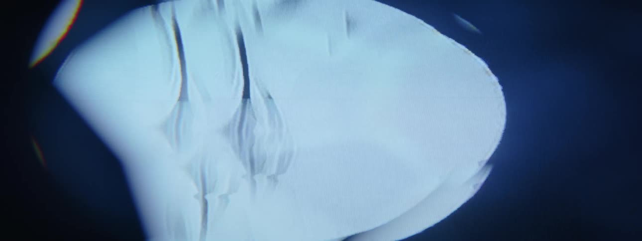 Extreme closeup on a moving abstract holographic projection