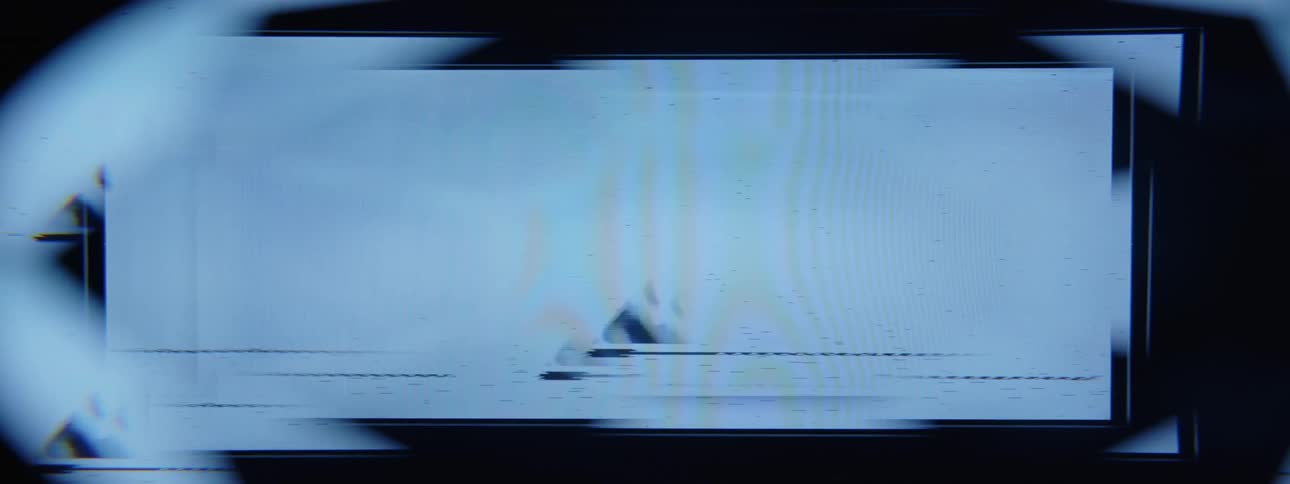 A screen plays a video graphic