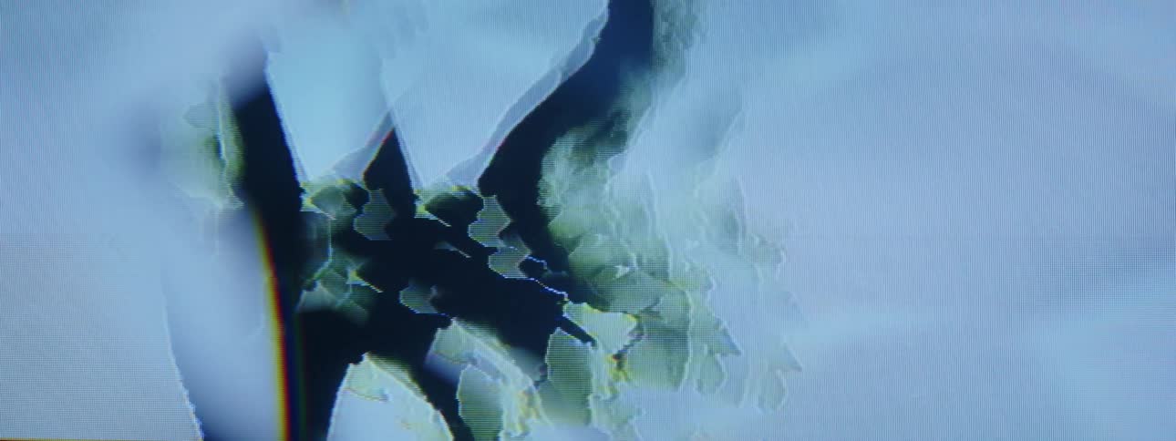 Dark and bright light effects flow across digital screen