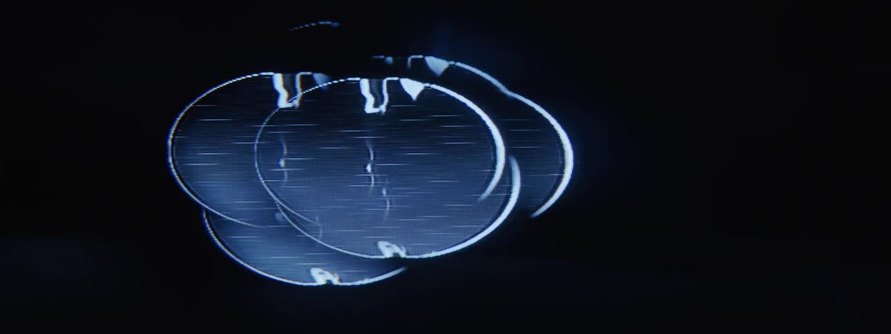The graphic has dark moving lines