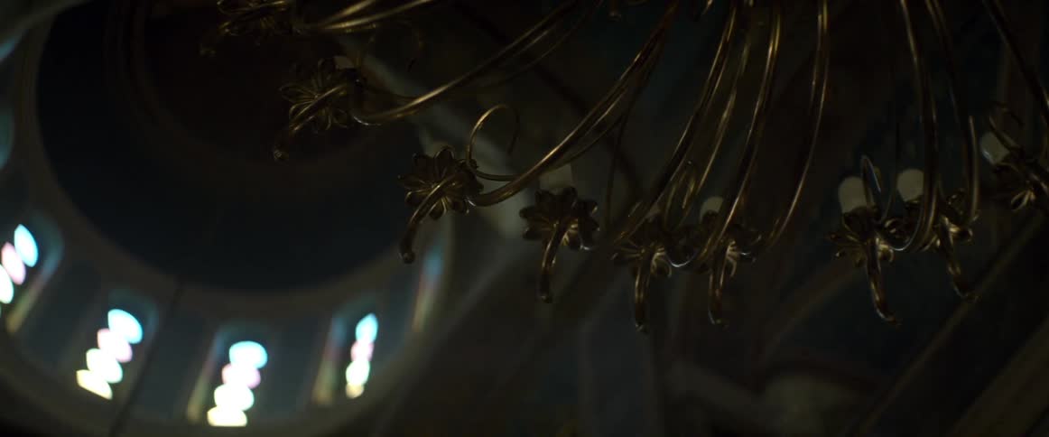 A view of a candle chandelier from the bottom
