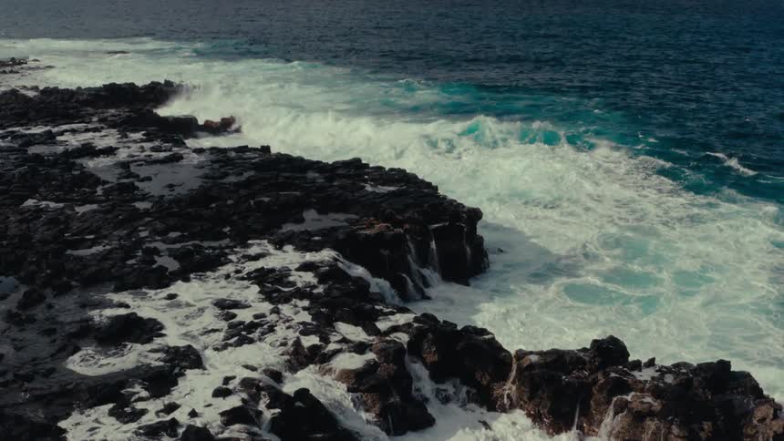 Ocean waves crashing on the rocky shore