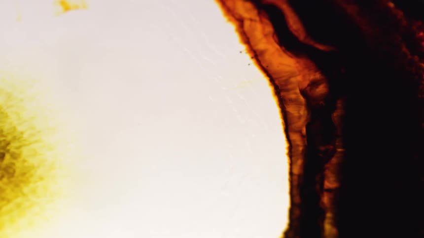 A bright wave spreads in the liquid art