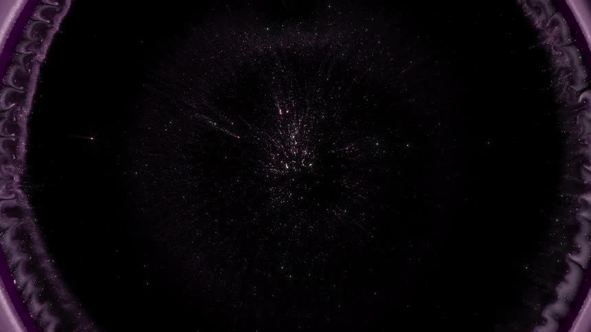 A circular explosion of purple particles on a black background