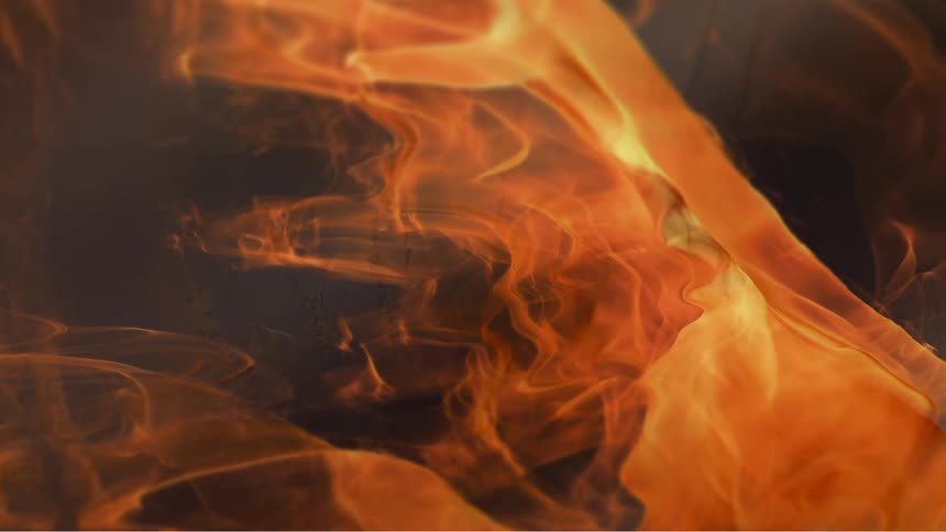 Orange smoke moving towards the left