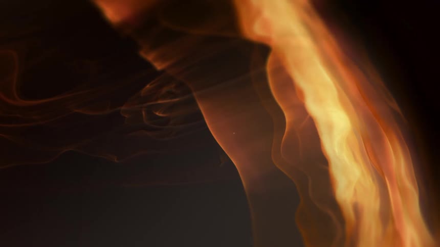 Waves of a bright yellow liquid or smoke waving against a dark background