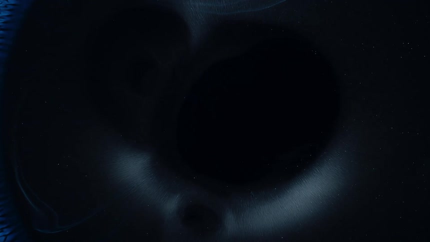Abstract dense liquid expanding against a black background