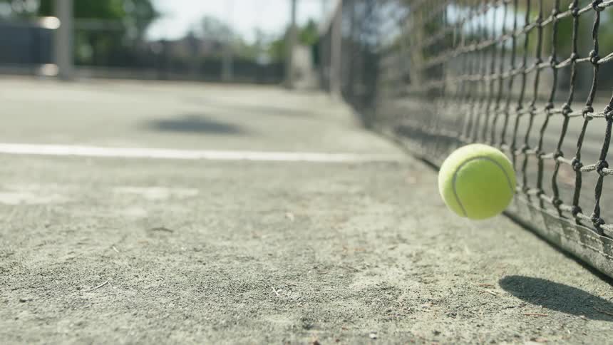 Tennis ball bouncing on the court