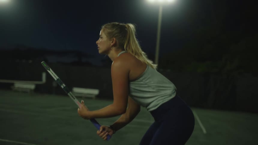 A clip of a lady holding a tennis racket