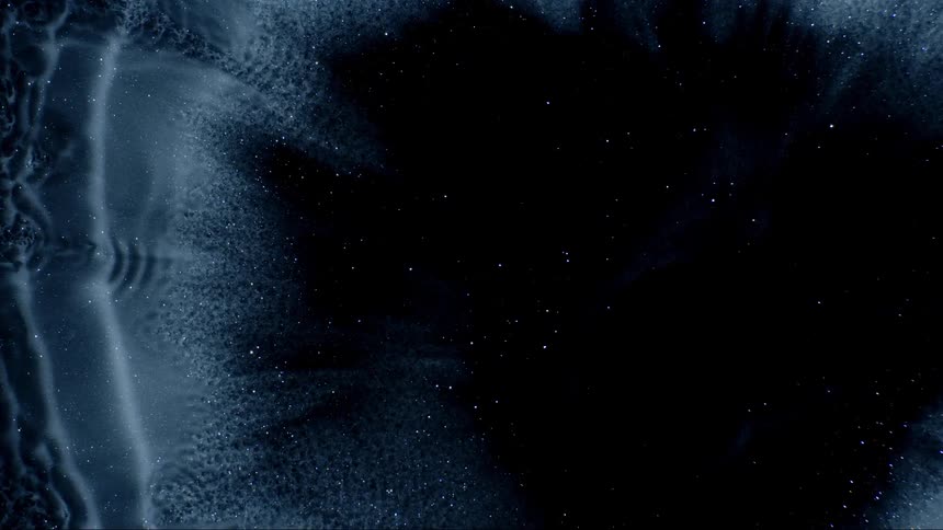 Bright whitish dense smoke on a black background