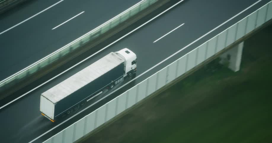 Aerial view of a truck traveling on a highway