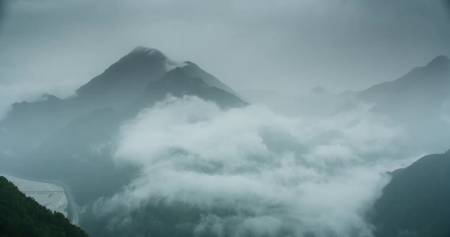 Heavy fog covers the mountains