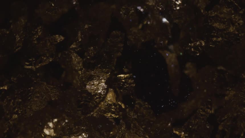 Light reflects off the metallic surface in the animation