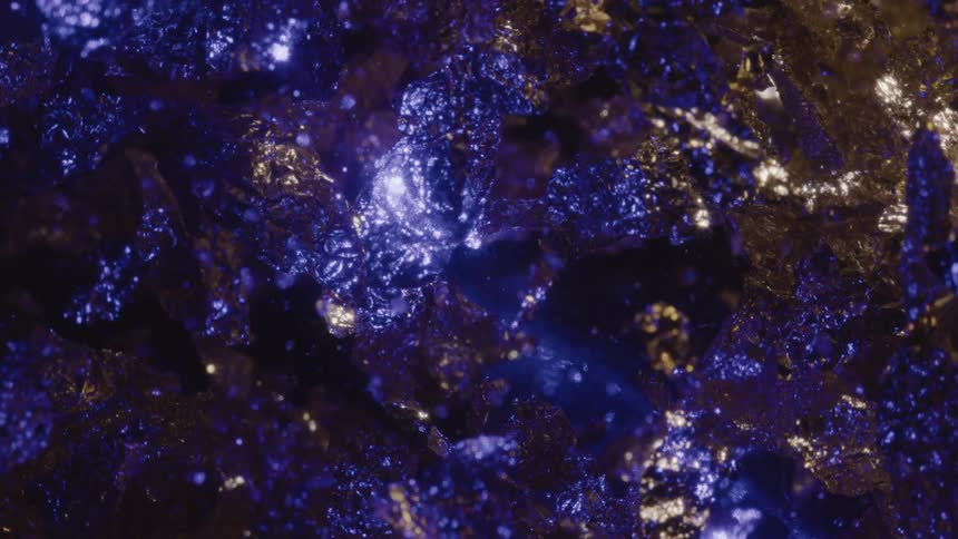 Liquid with abstract purple lights and shiny leaves