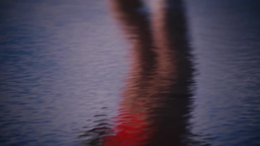 Shadow of a womans legs rollerblading