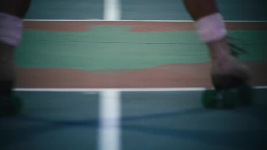 Legs of a person rollerblading