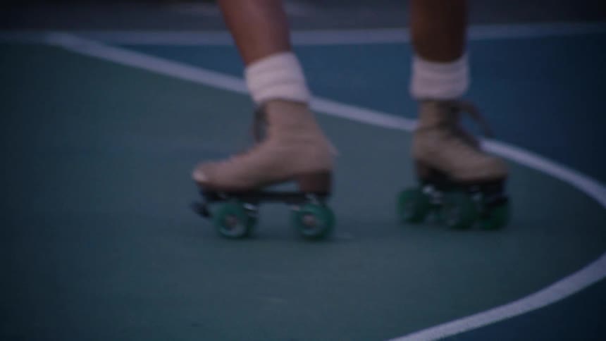 Legs of a person rollerblading